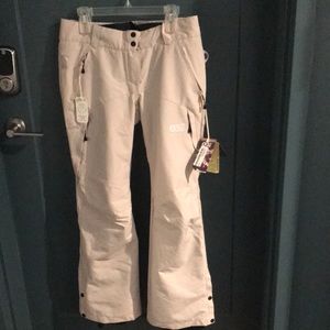 Treva ski pants. Never worn. Still have tags.Light beige in color